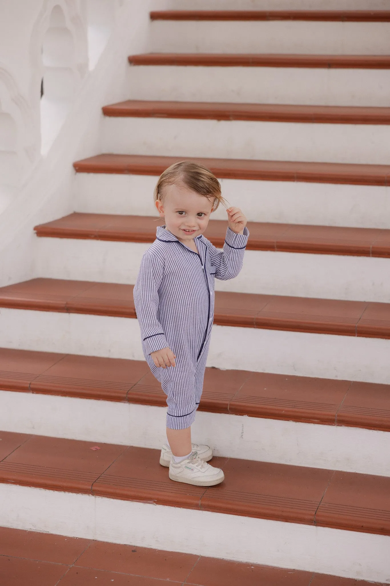 The Jubilee Baby Pajama Romper in Navy